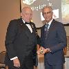 A. King Lotz III receives Inductee A. King Lotz Jr.'s DAHF medallion from DAHF President Bruce Lambrecht