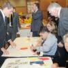 DAHF trustee and Honors Banquet ticket sales chairman Bruce Marvel (right) checking in guests.