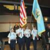 United States and Delaware flags posted by the Civil Air Patrol Cadet Color Guard.
