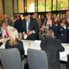 Guests signing in at UD Clayton Hall conference center.