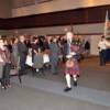 Bagpiper leading Color Guard and DAHF dignitaries and honorees into dining room.
