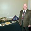 Inductee Kennard Robert Wiggin's son Kennard Jr. with the display